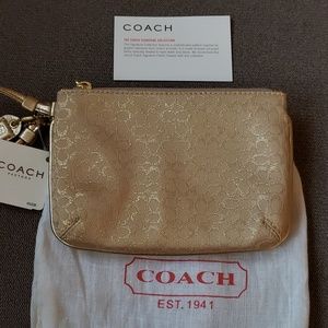Coach gold wristlet